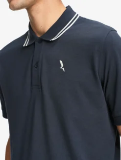 Polo Dry Fast™ à col rabattu avec logo sur la poitrine - Bleu