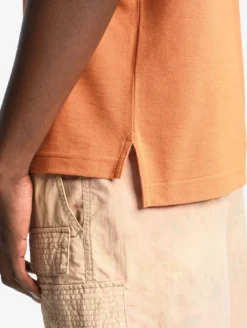 Polo Dry Fast™ à col rabattu avec logo sur la poitrine - Orange
