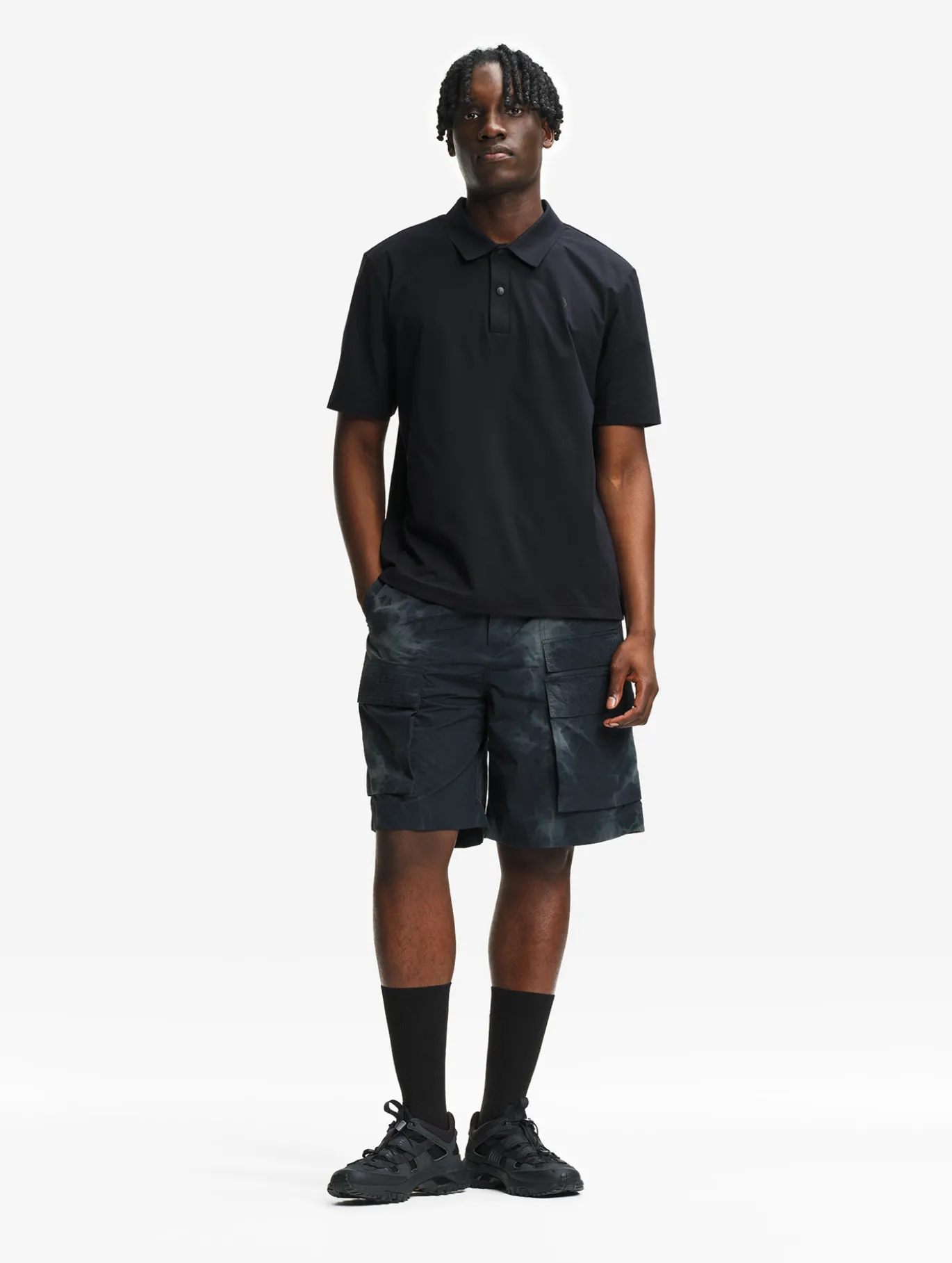 Polo Dry Fast™ TEXTILE® anti-UV avec logo sur la poitrine - Noir
