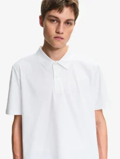 Polo Dry Fast™ TEXTILE® anti-UV avec logo sur la poitrine - Blanc